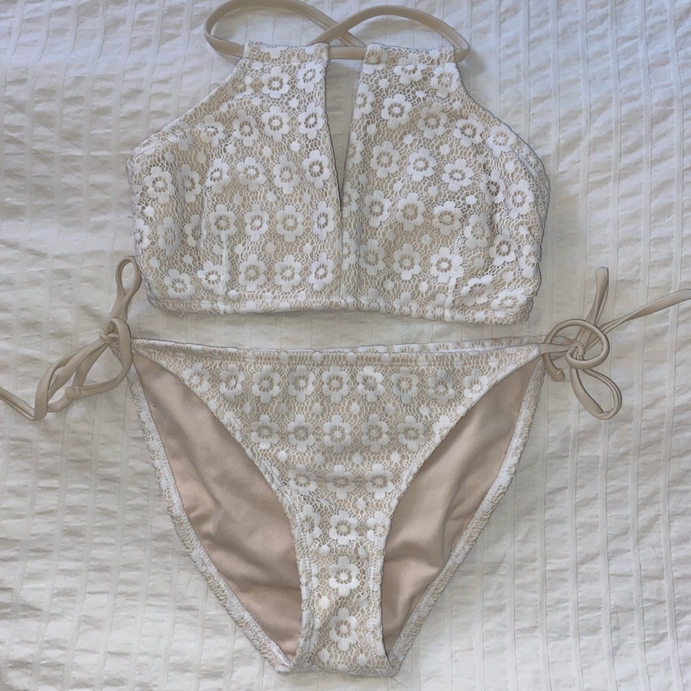 Medium white bathing suit with floral pattern